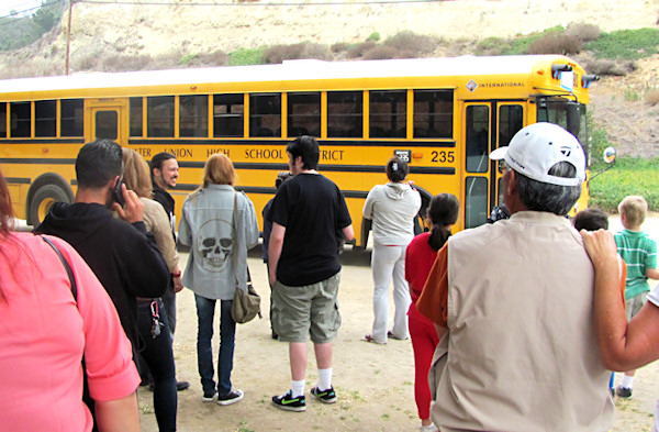 waiting  shuttle bus at horsepark to Del Mar Fair